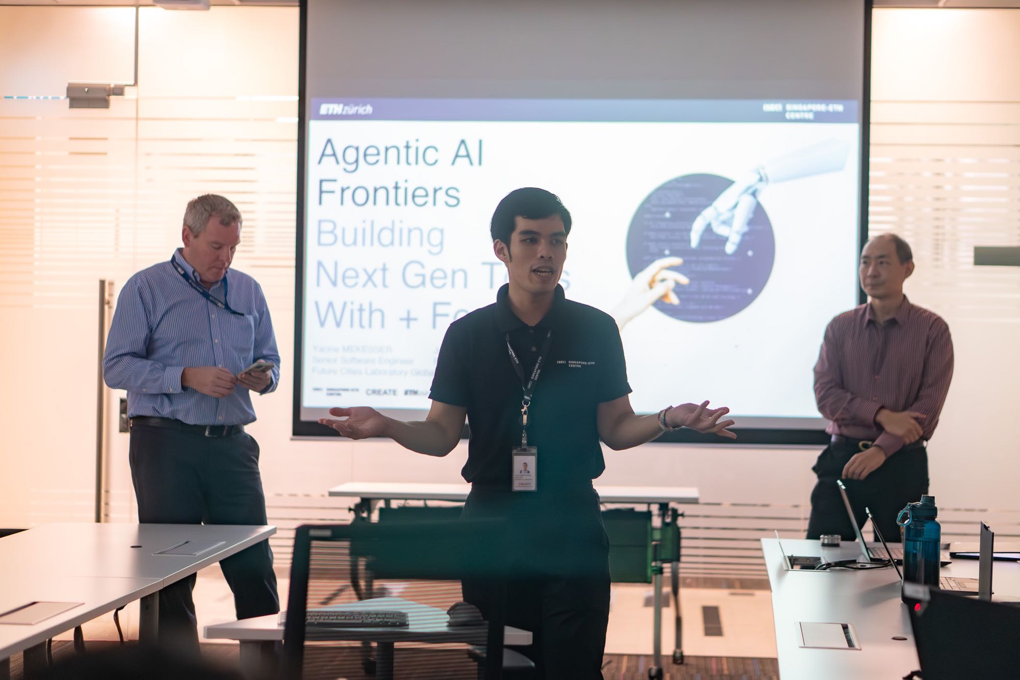 Joshua Vargas speaking at the ‘Agentic AI Frontiers’ workshop where this prototype was presented.