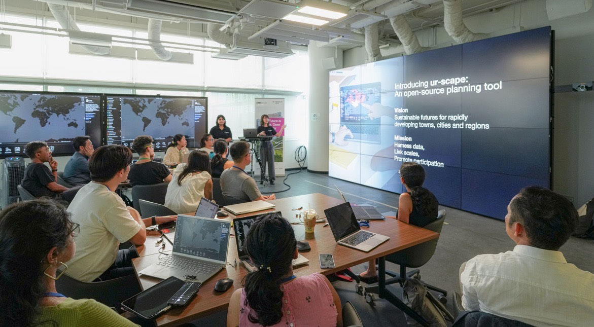 Facilitators guiding groups through data-driven planning exercises.